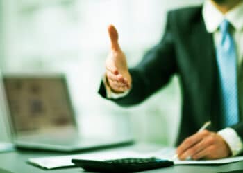 L Businessman Giving A Hand