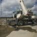 A Terex Corp. crane sits on the construction site of the American Mobility Center (ACM) in Ypsilanti, Michigan, U.S., on Tuesday, Aug. 15, 2017. Representative Debbie Dingel, a Democrat from Michigan, and Representative Bob Latta, a Republican from Ohio, visited the ACM to meet with experts in the autonomous vehicles industry as the two work together to advance bipartisan self-driving vehicle legislation through the House floor.