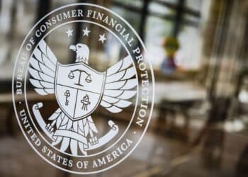 A seal at the Consumer Financial Protection Bureau (CFPB) headquarters in Washington, D.C., U.S., on Saturday, April 16, 2022. The Credit-reporting company TransUnion is an "out-of-control" repeat offender engaging in deceptive marketing practices the CFPB alleged this week after filing a lawsuit.