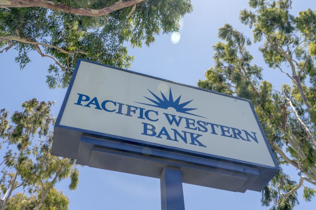Signage for a Pacific Western Bank branch in Corona, California