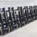 Modern forklift trucks stored outside