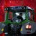 An employee drives a Fendt 200 Vario tractor onto the final quality control line