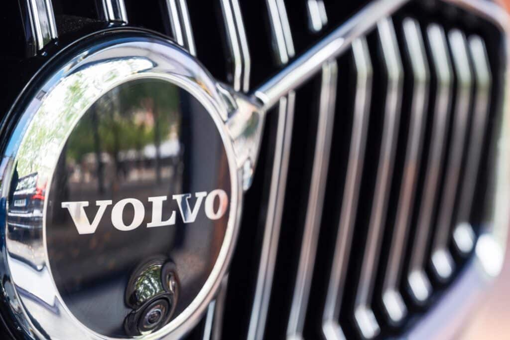 A Volvo badge and parking-assist camera on the grille of an automobile at a Volvo Cars AB dealership in Stockholm, Sweden, on Thursday, Aug. 19, 2021. Volvo Cars said its considering an initial public offering months after calling off earlier plans to merge with Geely Automobile Holdings Ltd., the Chinese manufacturer owned by its parent.