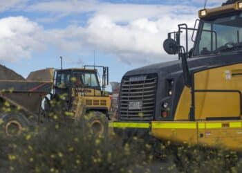 Komatsu Ltd. dump trucks at Western Sydney International Airport (WSI) in Badgerys Creek, Australia, on Wednesday, July 5, 2023. The Qantas Group and Western Sydney International Airport have reached an agreement last month for both Qantas and Jetstar to operate domestic flights from the new airport, which is on track to open in late 2026.