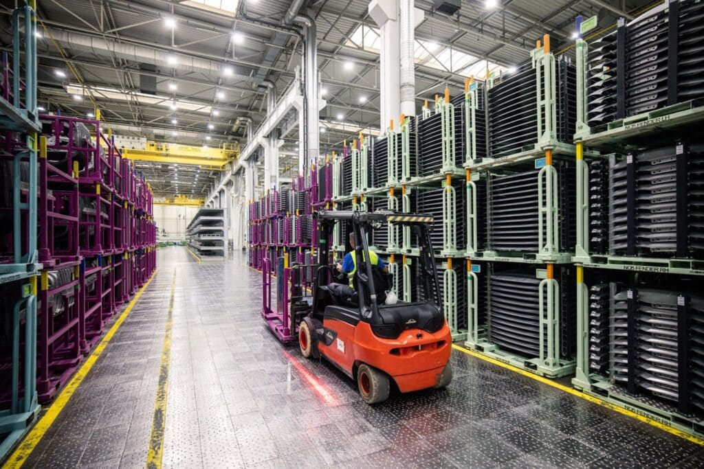 A worker operates a forklift in the press shop at the Kia Slovakia sro plant in Zilina, Slovakia, on Friday, Oct. 27, 2023. European auto sales maintained double-digit growth in September despite higher interest rates raising the cost of acquiring a car.