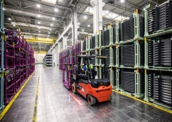 A worker operates a forklift in the press shop at the Kia Slovakia sro plant in Zilina, Slovakia, on Friday, Oct. 27, 2023. European auto sales maintained double-digit growth in September despite higher interest rates raising the cost of acquiring a car.