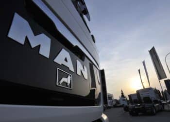 A MAN truck sits parked at a MAN dealership in Ingolstadt, Germany, on Monday, Sept. 26, 2009. MAN SE, Europe's third-largest truckmaker, is seeking manufacturing partnerships rather than mergers to respond to shrinking global markets, the chief executive officer of the commercial-vehicle division said.