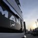 A MAN truck sits parked at a MAN dealership in Ingolstadt, Germany, on Monday, Sept. 26, 2009. MAN SE, Europe's third-largest truckmaker, is seeking manufacturing partnerships rather than mergers to respond to shrinking global markets, the chief executive officer of the commercial-vehicle division said.