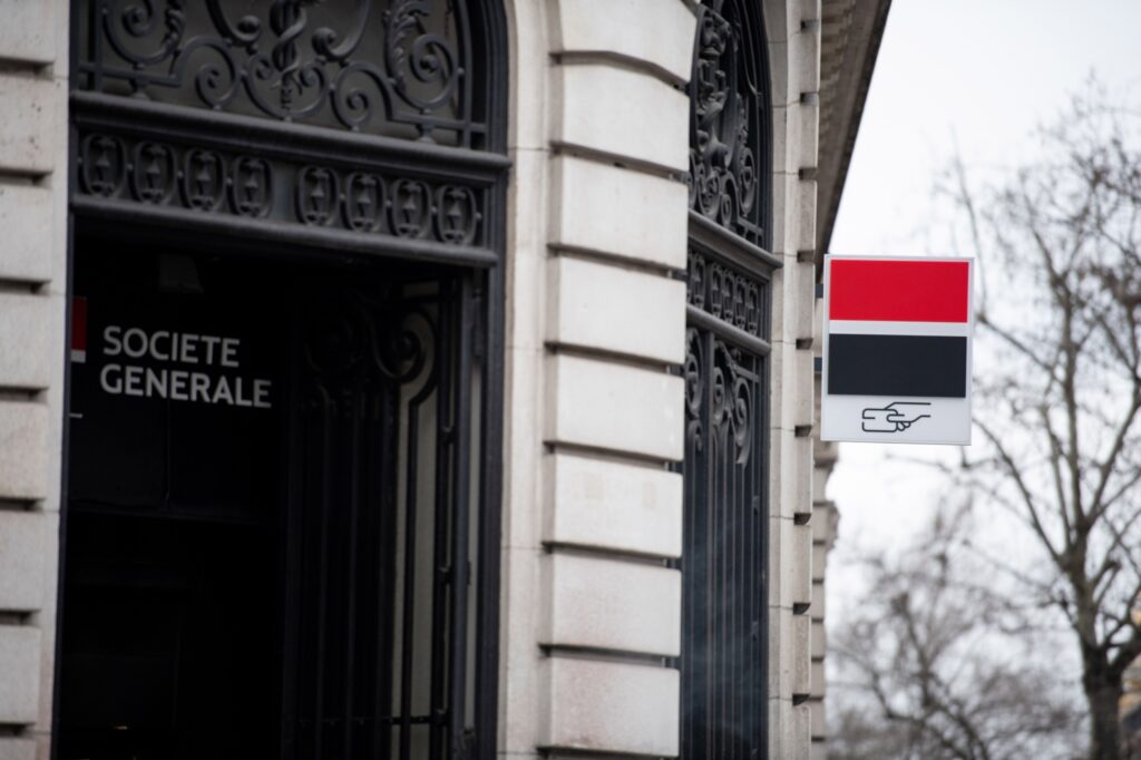 A sign outside a Societe Generale SA bank branch in central Paris, France, on Monday, Feb. 5, 2024. Societe Generale plans to cut about 900 jobs at its French head office as part of Chief Executive Officer Slawomir Krupas plan to cut costs and strengthen capital. 