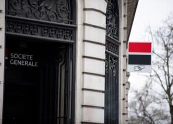 A sign outside a Societe Generale SA bank branch in central Paris, France, on Monday, Feb. 5, 2024. Societe Generale plans to cut about 900 jobs at its French head office as part of Chief Executive Officer Slawomir Krupas plan to cut costs and strengthen capital.