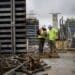 Workers interact at a Tribute Communities Ltd. condominium construction site in Toronto, Ontario, Canada, on Friday, May 26, 2017.