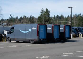 Electric Vehicles (EV) at the Amazon Delivery Station in Maple Valley, Washington, US, on Thursday, March 14, 2024.