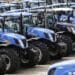 Newly manufactured New Holland T6 and T7 tractors stand parked in a yard ahead of shipping at CNH Industrial NV's assembly plant in Basildon, U.K., on Wednesday, July 2, 2014. CNH Industrial plans to more than double profit by 2018 as the maker of Iveco trucks and New Holland tractors sets its sights on expansion in Asia.