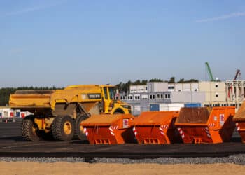 A Volvo AB dumper truck and skips sit on the Tesla Inc. Gigafactory building site in Gruenheide, Germany, on Sunday, Sept. 20, 2020. The plant that underpins its European expansion plans is slated to start production in the summer of 2021. 