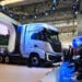Visitors watch the unveiling of a Nikola Corp. Tre FCEV truck at the IAA Transportation show in Hanover, Germany, on Monday, Sept. 19, 2022. Global leaders Daimler Truck Holding AG and Volvo AB are joining dozens of commercial-vehicle makers in Germany this week to showcase their latest electric semis, with more zero-emissions vehicles debuting at the IAA Transportation show than ever before.