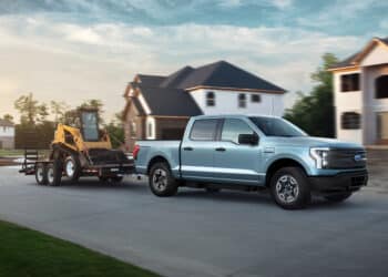2022 Ford F-150 Lightning Pro. Pre-production model with available features shown. Available starting spring 2022. Max towing varies based on cargo, vehicle configuration, accessories and number of passengers.