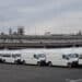 Toyota Motor Corp. Hiace vans bound for shipment parked near the Nagoya port in Nagoya, Japan, on Tuesday, June 18, 2024. Japans exports grew at the fastest clip since late 2022 as the weak yen boosted their value, a positive development for the nations manufacturing sector.