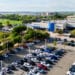 AUSTIN, TEXAS - MARCH 18: In an aerial view, cars sit on the lot at the Howdy Honda dealership on March 18, 2024 in Austin, Texas. Honda Motor and Nissan Motor shares rose significantly after the companies announced a collaboration on electric vehicles. Nissan shares have risen 5.6%, with Honda shares rising 2.7%. The collaboration is an effort to compete with other automakers both in the U.S. and China. (Photo by Brandon Bell/Getty Images)