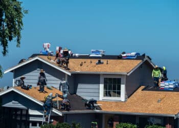 Workers install roofing on a home in Crockett, California, US, on Thursday, June 6, 2024. The Mortgage Bankers Association is scheduled to release mortgage applications figures on June 12.
