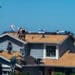 Workers install roofing on a home in Crockett, California, US, on Thursday, June 6, 2024. The Mortgage Bankers Association is scheduled to release mortgage applications figures on June 12.