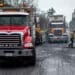A paving crew lays down new tarmac on a road in Victoria, British Columbia, Canada, on Thursday, March 24, 2022. The province is working to bring roads and highways back to full capacity after record-breaking amounts of rain last November.