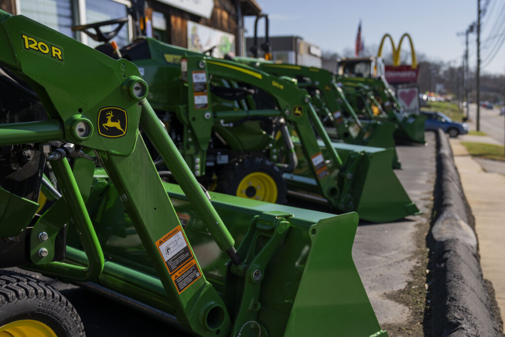 John Deere equipment for sale at a United Ag and Turf dealership in Colchester, Connecticut, US, on Friday, Nov. 3, 2023. Deere & Co. is expected to release earnings figures on November 22.