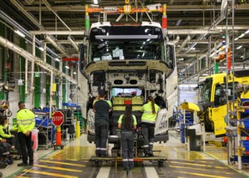 Employees marry a cab to a chassis on the assembly line at Volvo AB Trucks Tuve plant in Gothenburg, Sweden, on Thursday, May 4, 2023. Volvo are due to release their latest earnings on Wednesday, July 19, 2023.