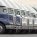 Used International trucks manufactured by Navistar International sit on the lot of the company's used truck facility in Melrose Park, Illinois Wednesday, Aug. 15, 2001. The fourth-largest truckmaker reported fiscal third-quarter earnings fell 98 percent as a glut of used trucks and the effects of the slowing U.S. economy reduced demand. The Melrose Park lot, one of 15 company owned lots, has nearly 300 trucks in inventory.