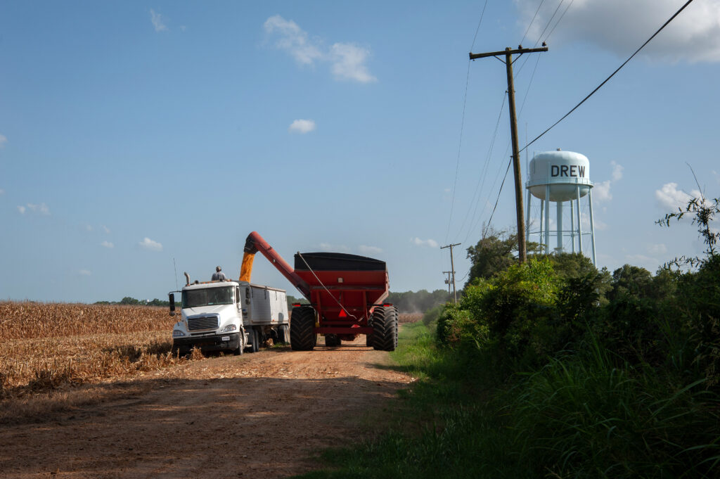 Farmers harvest corn in Drew, Mississippi, US, on Saturday, Aug. 12, 2023. It's difficult to find banks willing to give home loans to the low-income, Black residents who make up the majority of the population in Drew, Mississippi  a flaw in a US government-backed lending system meant to help aspiring buyers in communities like these.