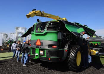 A John Deere 9700 Self Propelled Forage Harvester at the World Agriculture Expo in Tulare, California, US, on Tuesday, Feb. 13, 2024. The annual World AG Expo has more than 1,200 exhibitors displaying the latest in farm equipment, chemicals, communications, and technology.