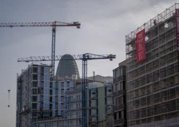 The Glories tower beyond residential building construction sites in Barcelona, Spain on Friday, March 22, 2024. In Barcelonas designated stressed residential market areas, new tenants are now entitled to a rent level no higher than the last lease agreement from the previous five years.