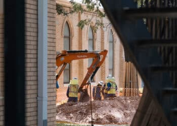 Construction workers in Austin, Texas, US, on Tuesday, July 2, 2024. Forecasters expect a monthly report on US employment to show a step-down in hiring in June alongside a moderation in wage growth.