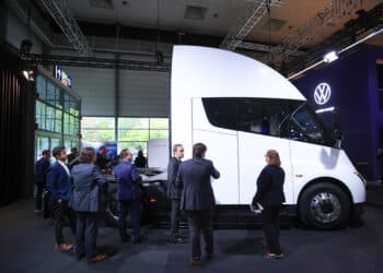 Visitors look at a Tesla Inc. semi electric truck, at the IAA Transportation fair in Hannover, Germany, on Monday, Sept. 16, 2024. The commercial vehicle exhibition runs until Sept. 22.