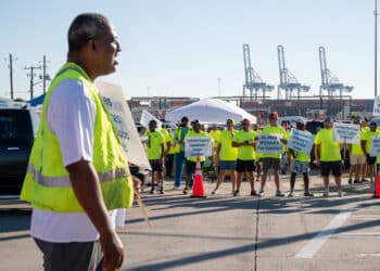 Workers picket outside of the Port of Savannah in Savannah, Georgia, US, on Thursday, Oct. 3, 2024. Dockworkers walked out of every major port on the US East and Gulf coasts for the first time in nearly 50 years, staging a strike that could ripple across the world's largest economy and cause political turmoil just weeks before the presidential election.