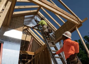 Workers build homes in Lillington, North Carolina.