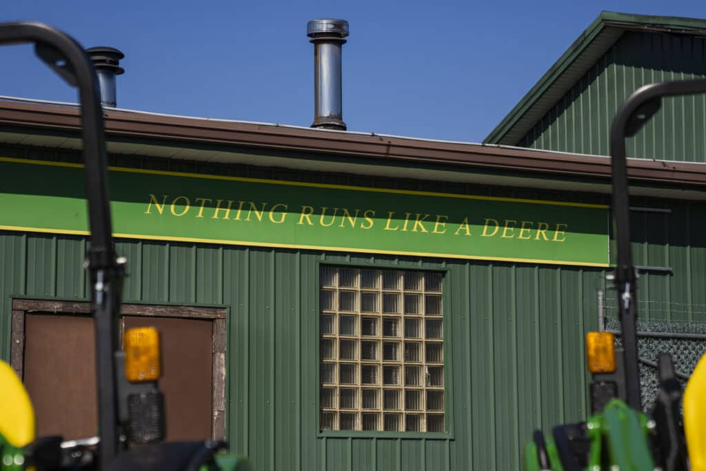 John Deere signage at a United Ag and Turf dealership in Colchester, Connecticut, US, on Friday, Nov. 3, 2023. Deere & Co. is expected to release earnings figures on November 22. 