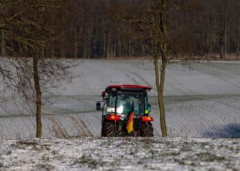 A tractor leaves the meeting point at a farmers protest against the German government's planned cuts to agricultural sector subsides, in Meseberg, Germany, on Wednesday, Jan. 10, 2024. Chancellor Olaf Scholz and his ministers have acknowledged the farmers right to demonstrate peacefully while warning of the threat of the protests being exploited by extremist and anti-democratic forces.