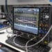 A machine used to test chips at Annapurna Labs in Austin, Texas, US, on Mon. Oct. 21, 2024. In a bland north Austin neighborhood dominated by anonymous corporate office towers, Amazon.com Inc. engineers are toiling away on one of the tech industrys most ambitious moonshots: loosening Nvidia Corp.s grip on the $100-billion-plus market for artificial intelligence chips.