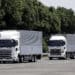 Hino Motors Ltd. autonomous trucks travel in convoy during a demonstration at a test course in Hamura, Tokyo Metropolis, Japan, on Monday, May 21, 2018. The Japanese bus and truck maker said today it will aim to have vehicles capable of complete self-driving in limited areas as soon as 2025, including driverless convoys.