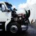 A Kenworth T680E electric truck at Hight Logistics in Long Beach, California, US, on Monday, Dec. 5, 2022. Forum Mobility replaces diesel drayage freight trucks, a major source of toxic emissions, with electric models for a monthly fee.