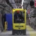 An employee drives a narrow aisle truck, manfactured by Hyster Co., in the tunnel system at the Cigeo project, a nuclear laboratory and underground storage facility site operated by National Agency for Radioactive Waste Management (Andra), in Bure, France, on Monday, March 25, 2019. France, which produces more nuclear waste per-capita than any other country, is the world's second-biggest producer of nuclear energy, just behind the U.S. and just ahead of China.