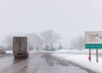 A tractor trailer approaches the Peace Bridge at the Canada-US border in Fort Erie, Ontario, Canada, on Monday, Feb. 3, 2025. US President Donald Trump's move to invoke an emergency and impose tariffs on Canada, Mexico and China is the most extensive act of protectionism taken by a US president in almost a century.