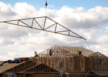 Workers at a home under construction in Tucson, Arizona.