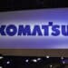 Komatsu signage during the ConExpo-Con/Agg tradeshow in Las Vegas, Nevada, US, on Wednesday, March 15, 2023. As electric SUVs and sedans roll onto American highways, diesel still reigns supreme on US construction sites. But walk around the industrys largest trade conference in Last Vegas this week, and the first signs of battery power have finally arrived.