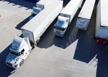 Tractor trailers at a truck depot along the US-Mexico border in Ciudad Juarez, Chihuahua state, Mexico, on Tuesday, Feb. 4, 2025. US President Donald Trump agreed to delay 25% tariffs against Mexico for one month after a conversation with his counterpart Claudia Sheinbaum on Monday, a dramatic turnabout with the neighboring nations on the brink of a trade war.