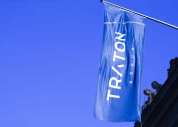 The Traton SE logo sits on a banner as Volkwagen AG's truck unit makes its initial public offering (IPO) at the Frankfurt Stock Exchange, operated by Deutsche Boerse AG, in Frankfurt, Germany, on Friday, June 28, 2019. Volkswagen raised 1.55 billion euros ($1.8 billion) selling a stake in its trucks business, but only after pricing the offer at the low end of a target range to attract investors to one of Europes biggest initial public offerings this year.