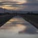 Reflections on the water of the Main Canal in California. TAB