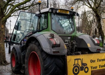 A parked tractor during a protest against changes to an inheritance tax exemption outside the National Farmers' Union (NFU) annual conference in London, UK, on Tuesday, Feb. 25, 2025. Under the new policy, farms valued over £1 million ($1.3 million) would face a 20% tax when handed down from one generation to the next.