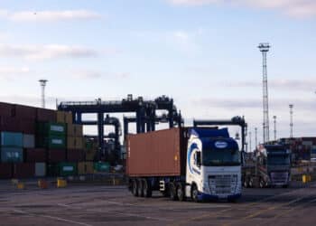A truck collects a shipping container from Felixstowe port in Felixstowe, UK, on Wednesday, April 9, 2025. The UK doesnt plan to use a get-out clause to override her fiscal rules, even as the US tariff war roiled global markets, forcing down the pound and UK gilts.