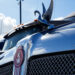 A swan hood ornament on a Kenworth semi truck at Hight Logistics in Long Beach, California, US, on Monday, Dec. 5, 2022. Forum Mobility replaces diesel drayage freight trucks, a major source of toxic emissions, with electric models for a monthly fee. Paccar